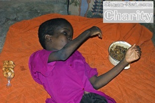 Behinderte junge Frau, Nordghana